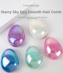 Macro detail of egg-shaped hairbrushes with multi-level bristles and starry glitter finish