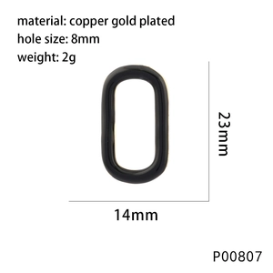 Detail showing 23x14mm black enamel oval pendant dimensions and gold-plated copper material