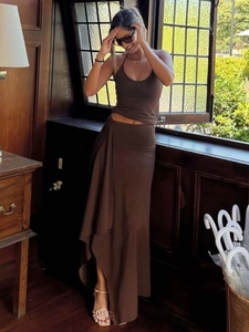 Women's chic dark brown two-piece set with halter crop top and irregular maxi skirt