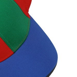 Detail of colorful cotton twill panels and reinforced stitching on the rainbow baseball cap