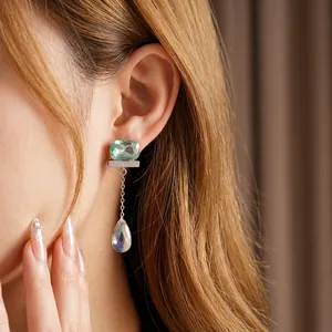 Elegant Korean silver needle earrings with green rectangular gem and teardrop crystal