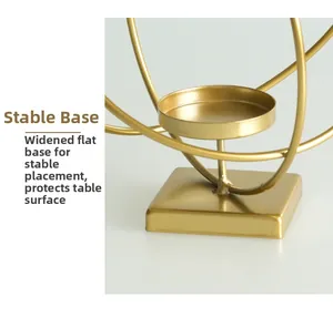 Detail of a stable wide square gold metal base with electroplated finish on candlestick