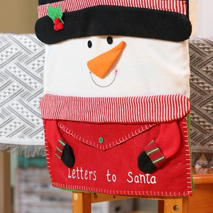 Detail of snowman chair cover featuring red mailbox pocket and Letters to Santa embroidery