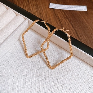 Minimalist gold irregular geometric square earrings with textured crushed gold finish