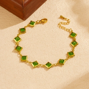 Vintage gold plated stainless steel bracelet with green square stones and lobster clasp