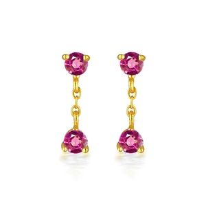 Detail view of gold drop earrings with double pink round-cut crystals and fine chain