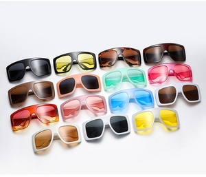Collection of 14 colorful oversized square sunglasses in various frames and gradient lenses