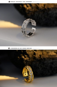 Macro detail of lava texture silver and gold ear cuffs with sparkling zircon stones