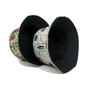 London themed digital print bucket hat featuring Big Ben and red bus designs