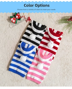 Detail view of multi-color striped knitted dog sweaters with festive Christmas decorations