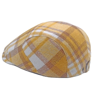 Detail shot of the vintage plaid wool flat cap showing checkered pattern and fabric texture
