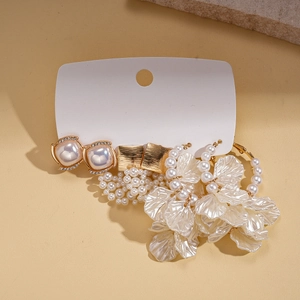 Elegant multi-set of pearl and rhinestone square petal tassel earrings in gold finish