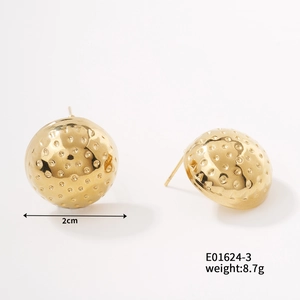 Detailed view of irregular 2cm gold hoop earrings showing textured surface and dimensions