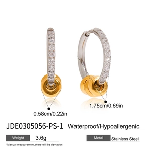 Detail view of two-tone stainless steel earrings with white diamonds and size annotations