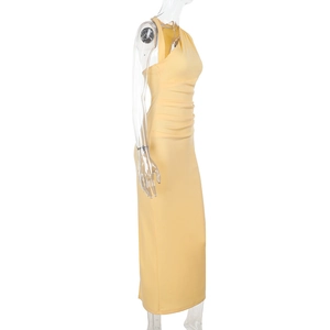 Detail view of yellow sleeveless bodycon midi dress with side ruched pleat design