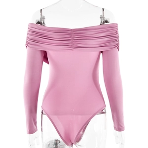 Close-up detail of pink off-the-shoulder bodysuit featuring elegant pleated textures