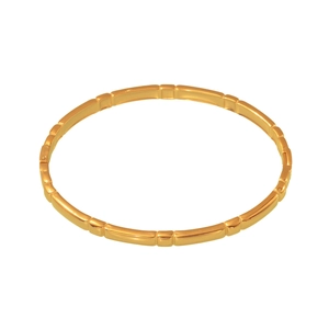 Polished gold bamboo-style stainless steel bangle with a segmented cylindrical design