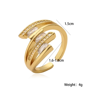 Macro detail of multi-layer 18K gold plated ring with marquise cut zircon stones