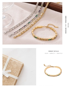 Detailed view of colorful zircon square bracelet with gold adjustable chain in gift box