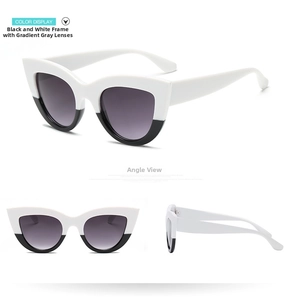 Retro cat eye sunglasses with black and white split frame and gradient grey lenses