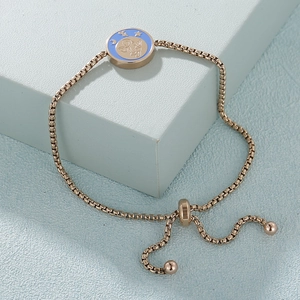 Bracciale zodiaco oro rosa con ciondolo unicorno smalto blu e catena a scatola regolabile