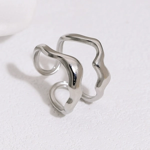 Minimalist silver wavy irregular open ring made of polished stainless steel
