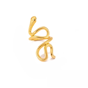 Detailed view of adjustable golden snake ring with embossed texture on polished steel