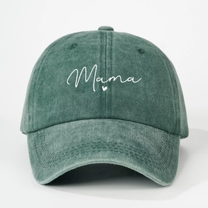 Close-up of vintage dark green washed cotton baseball cap with white Mama embroidery