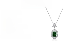 Macro detail of S925 silver necklace featuring 5ct radiant cut emerald green zircon stone