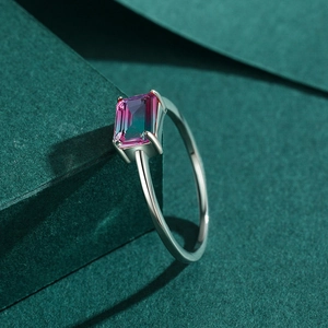 925 sterling silver ring with rectangular gradient gemstone on dark green background