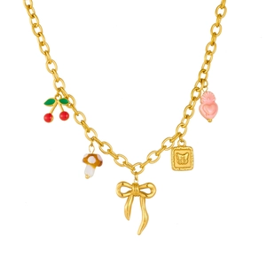 Gold chain necklace with colorful cherry, mushroom, and bow pendants on white background