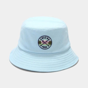 Detail of light blue cotton bucket hat featuring WILD & FREE mountain embroidery
