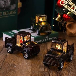 Retro Christmas truck lantern with warm LED lights and swirling glitter snow effect
