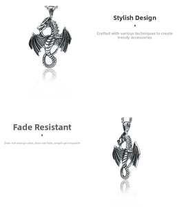 Detailed macro view of vintage silver flying dragon pendant with intricate gothic wings