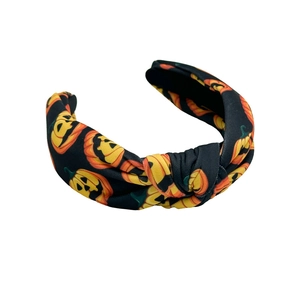 Serre-tête en tissu noué à motifs citrouilles d'Halloween sur fond noir