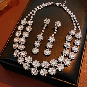 Exquisite double-layer crystal flower necklace and earrings jewelry set on black leather
