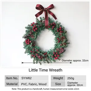32cm Christmas wreath with red berries, pine cones and burgundy velvet bow on white wall