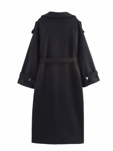Back view of a long black wool coat featuring a waist belt and cuff strap details