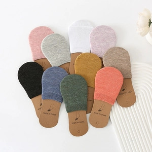 Flat lay of cotton invisible low cut socks in ten diverse pastel and neutral colors