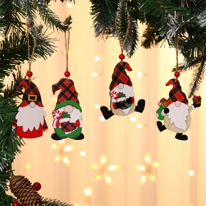 Set of 4 hand-painted wooden Christmas gnome ornaments with red plaid hats on a tree