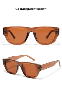 Detail view of transparent brown square sunglasses featuring silver metal rivets and frame