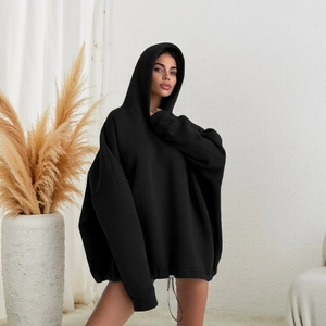 Women's oversized black drawstring hoodie with drop shoulders and a relaxed fit for autumn