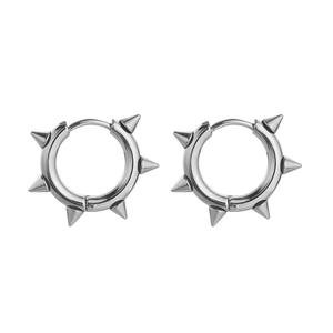 Polished silver stainless steel punk hoop earrings with six sharp spikes on white backdrop