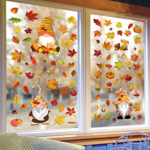 Detail of Fall window stickers featuring gnomes, maple leaves and Thanksgiving pumpkins