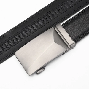 Detailed macro view of brushed silver automatic metal buckle and black textured leather belt