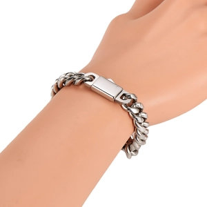 Mens silver stainless steel chunky Cuban link chain bracelet with a square clasp on wrist