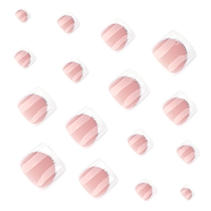 Classic French nude pink press-on toe nails with white tips and silver glitter accents