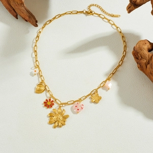 Gold plated stainless steel necklace with floral sunflower and heart pendants