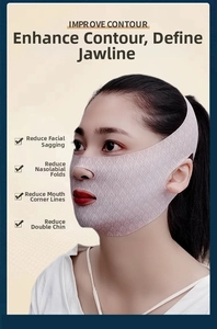 Detailed close-up of V-line lifting mask with breathable pink elastic fabric and ear-loop design
