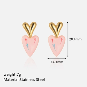 Detailed view of pink enamel heart earrings with floral pattern and dimensions